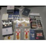 A collection of British proof coin sets and commemorative coins to include 1987, 1986, 1985 proof