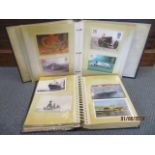 Two albums containing postal stamps, travel related postcards and others