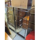 A pair of modern mirrored five-drawer chests 40 1/2"h x 18 1/2"w