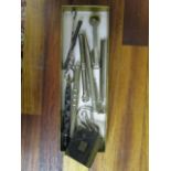 A group of white metal and silver plated propelling pencil and dip pens, button hooks, pipe