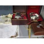 A pair of Royal Selanger pewter tankards in wooden presentation boxes, a pair of Jenoptem binoculars