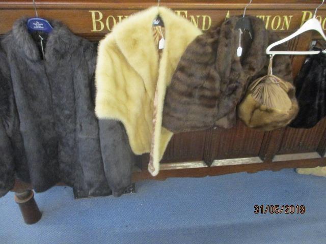 A selection of mid to late 20th century fur clothing to include two mink hats and an arctic wrap