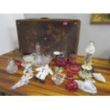 A mixed lot to include cranberry glassware, a vintage suitcase, Lladro and other items