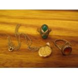 9ct gold jewellery to include two rings, one set with an orange stone and the other a green