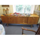 A mid 20th century G-Plan teak sideboard 31"h x 81"w