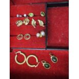 Eight pairs of gold and other earrings to include a pair of diamond examples