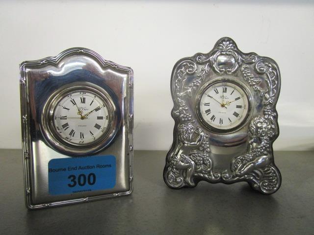 Two Richard Carr silver clad mantle/dressing table clocks