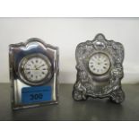 Two Richard Carr silver clad mantle/dressing table clocks