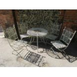 A Laura Ashley white painted metal garden table and four matching folding chairs