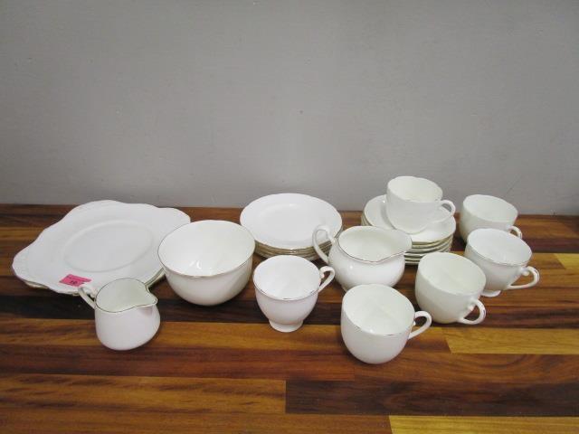 A Royal Grafton teaset, with gold trim, comprising twenty three pieces