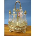 A Victorian silver plated seven clear glass bottle cruet set