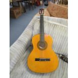 A Herald full size acoustic guitar