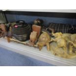 A mixed lot of African carved wooden animals to include a pair of elephant bookends, and a turned