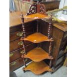 A Victorian mahogany four tier what-not having barley twist supports, 47" h x 23"w