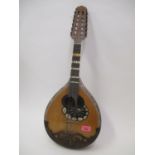 A Victorian mandolin with mother of pearl decoration