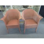 A pair of Lloyd Loom armchairs