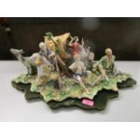 A large Naples porcelain Capodimonte figure group of a Gypsy caravan with figures cooking with a