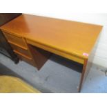 A mid 20th century G-Plan teak dressing table and a pair of bedside chests