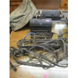 A vintage Royal typewriter A/F and two leather and metal bull harnesses