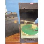 The Winston gramophone together with mixed records in two travelling cases and accessories