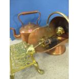 A Victorian copper kettle, a copper and brass coal scuttle with fireside accessories and a brass