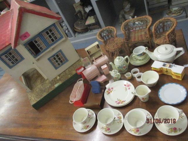 A vintage Triang doll house, together with mid 20th century dolls furniture and a larger dolls