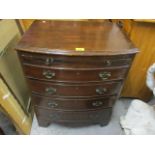 A mid 20th century mahogany bow fronted chest having brush slide above four long drawers, 30" h x