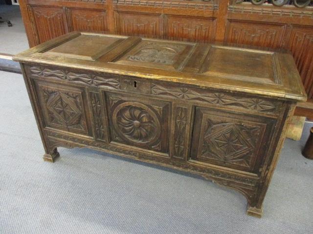 An 18th century oak carved, panelled coffer, 26 1/2"h x 51"w