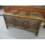 An 18th century oak carved, panelled coffer, 26 1/2"h x 51"w