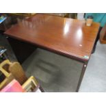 A mid 20th century exotic wood desk, 29 1/4"h x 47 1/4"w