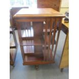 An early 20th century mahogany revolving bookcase, 32" x 18" x 18"