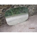 A 1930s wall mirror with a bevelled edge