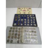 An album of various British coinage to include early 20th century copper pennies and various two