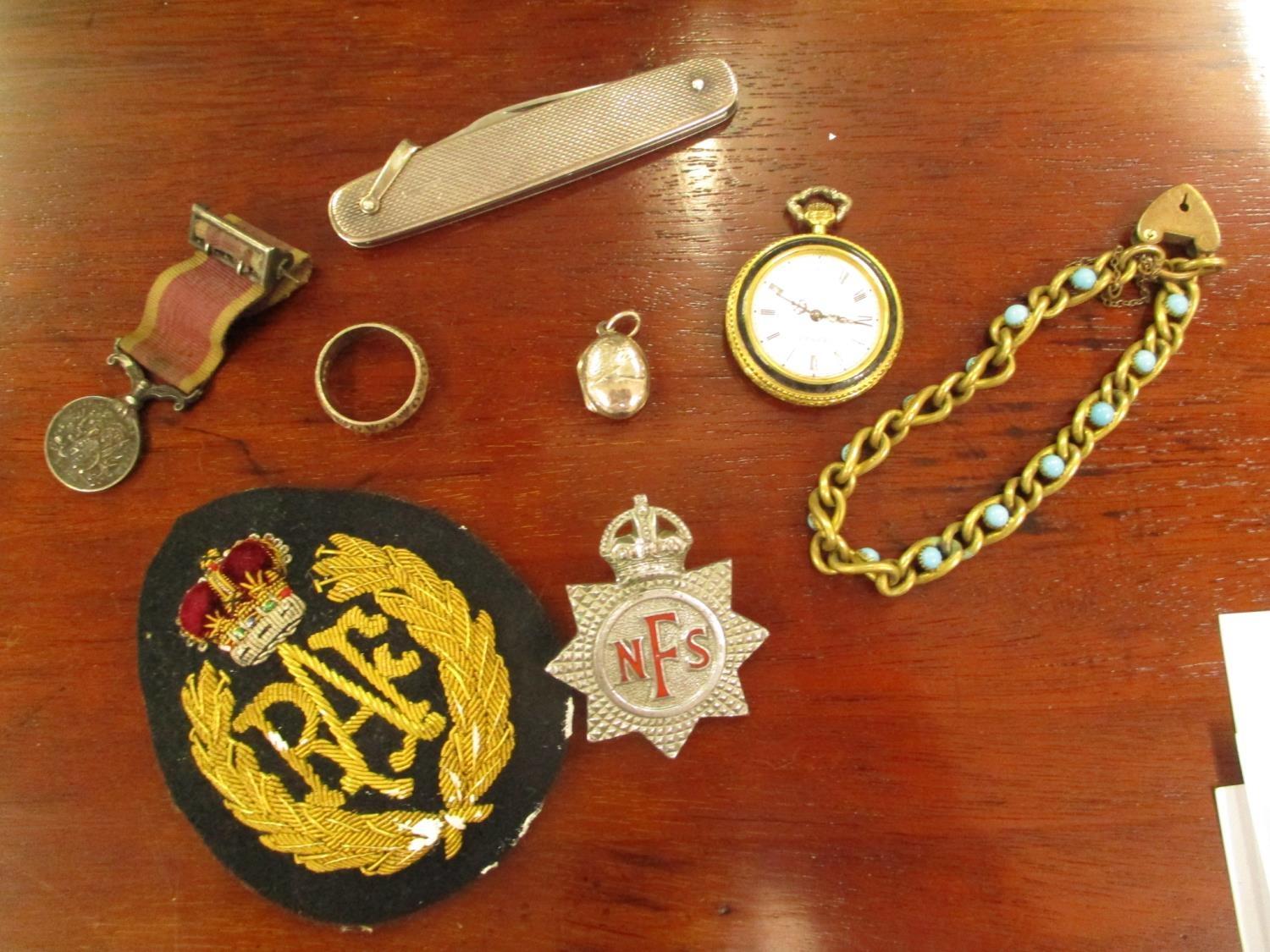 Silver, a military miniature Victorian medal, an RAF cloth badge, a silver sided penknife, an NFS