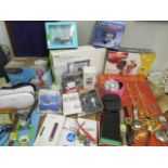 A selection of electricals, some boxed to include a 7" digital photo frame, mobile phones, and a