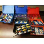 A quantity of Matchbox and Hot Wheels diecast model toy cars and other vehicles, all in five various