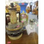 A large Continental ceramic vase with cornflower blue background with a gilt and painted floral