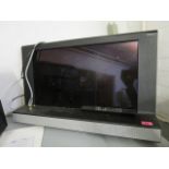 A Bang and Olufsen flat screen television with remote, 25"screen