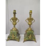 A pair of onyx and gilt metal side pieces converted into lamps