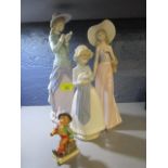 A Lladro figure of a young girl reading a book, two Nao figures and a small Goebel figure of a