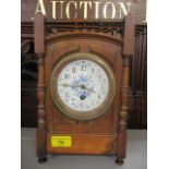 A late 19th century walnut mantle clock 11 1/4" h X 7"w