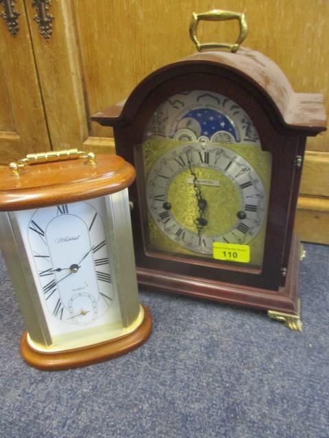 A reproduction mahogany cased moon-phased bracket clock and a Whittall mantel clock