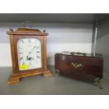 A Georgian mahogany box with brass mounts, feet and carrying handle, along with a Seiko quartz