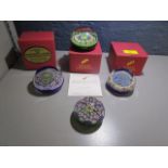 A group of four Perthshire glass paperweights to include PP167 limited edition weight No.157 with