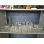 A quantity of cut glass table glass to include vases, water jugs, bowls, preserve pots and an