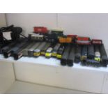 A selection of loose Hornby 00 gauge trains and accessories