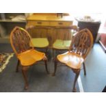 A pair of Stewart Linford Gothic Windsor yew chairs, together with two late Victorian/Edwardian