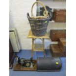 A Victorian bamboo occasional table, a wooden cased Vickers sewing machine and wicker cherry baskets