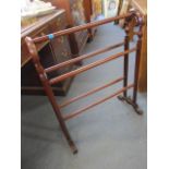 A Victorian mahogany towel rail