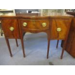 A Victorian serpentine fronted sideboard